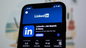 close up of a smartphone displaying linkedin application