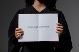 woman holding certificate with not enough experience