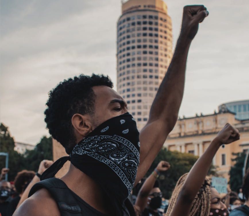 people protesting in a rally
